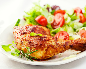 Roasted chicken leg with salad