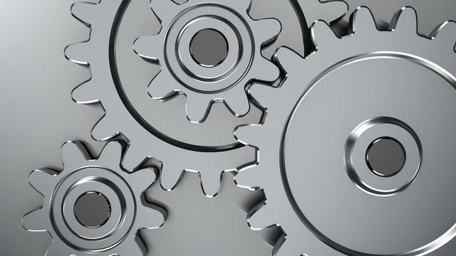 Rotating gears on steel background