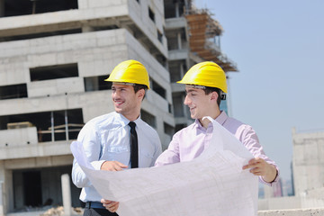 Team of architects on construciton site