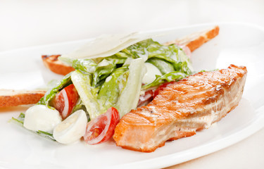 Fish steak with vegetables
