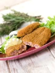 salmon croquettes with green salad