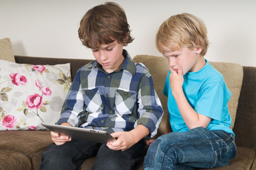 Kid working on a tablet computer