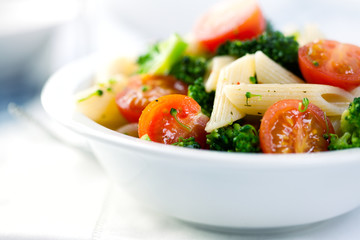 Pasta salad with cherry tomatoes and broccoli