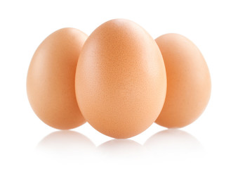 three eggs isolated on white