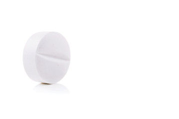 White medical pill on white background