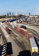 Naklejka premium Train Yard Showing Fort Worth in Background.