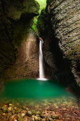 Beautiful waterfall in a cave. Kozjak, Alpine Slovenia - 35150603