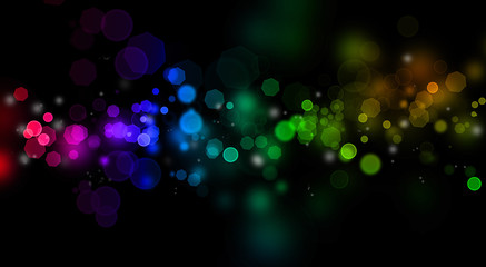 Abstract colorful blurs on dark background