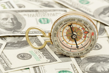Fototapeta na wymiar Dollars and compass