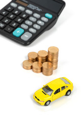 Toy car,calculator and coins