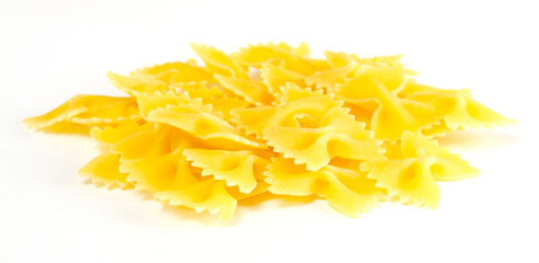 dried italian pasta on white background