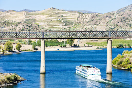 railway viaduct and cruise ship in Pocinho,Douro Valley,Portugal
