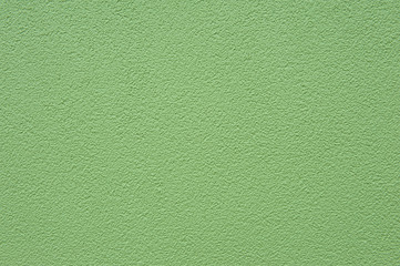 Grain green paint stucco wall texture bakground