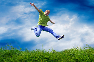 Fun man in jump on the outdoor background