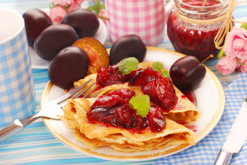 pancakes with fresh plum`s confiture