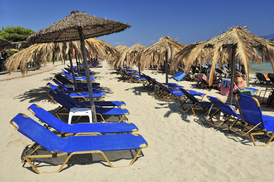 view of chairs and umbrella on the beach