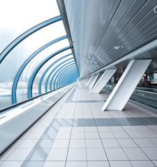 wide spacious corridor in contemporary airport walkway