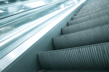 abstract striped texture of moving escalator closeup