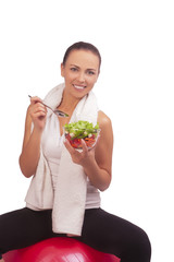 brunette girl with vegetable salad