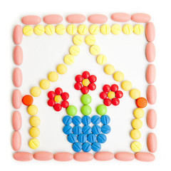 Flawor made of Pills isolated on white background