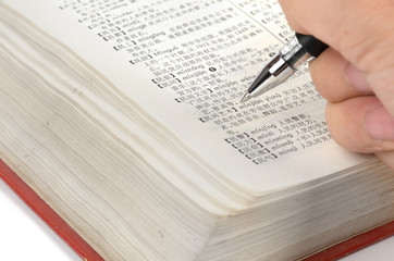 Pen and dictionary