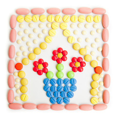 Flawor made of Pills isolated on white background