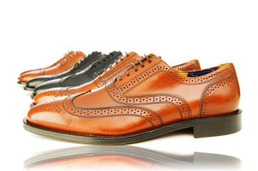 Fashion concept with male shoes on white