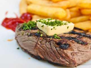 juicy steak beef meat with tomato and french fries