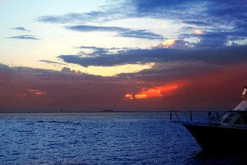 Caribbean sea sunset in Mexico Isla Mujeres boat