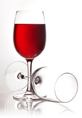 red wine pouring into glass