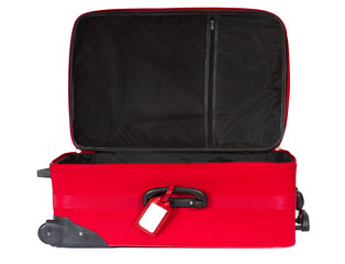 Open red suitcase with blank identification tag over white.