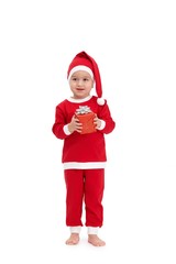 Cute kid in santa costume with gift