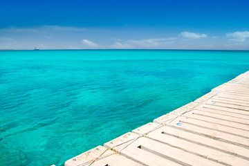 Fototapeta na wymiar illeta wooden pier turquoise sea Formentera