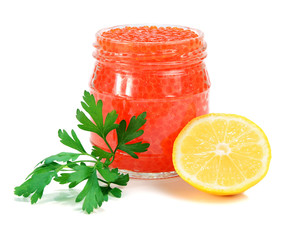 caviar red in a glass jar with lemon and parsley