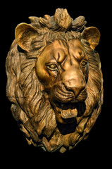 Bronze lion head on black