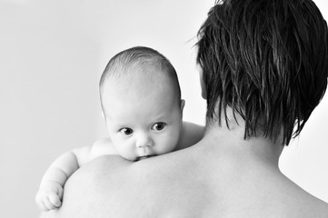 baby on father's shoulder