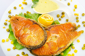 Roasted salmon in the plate