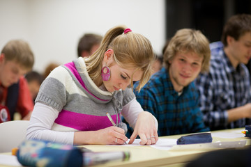 college student sitting in a classroom