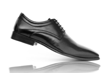 Fashion concept with male shoes on white