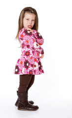 Young girl sticking tongue out