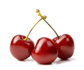 Fototapeta na wymiar Three cherries