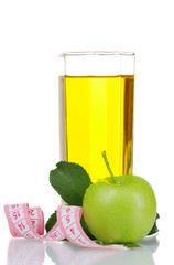 Glass of fresh apple juice with measuring tape isolated on white