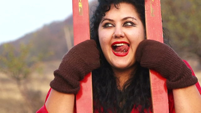 Funny girl with skis