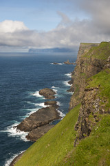 Scenic view of coast of Mykines, Faroe Islands