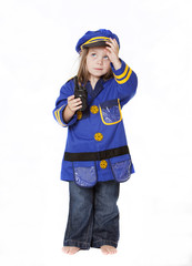 Fototapeta premium Little Girl in Police Costume