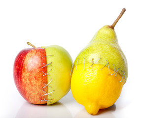 A apple, pear and lemon putted together like Frankenstein