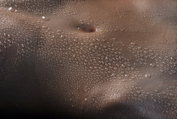 Belly of  guy with drops