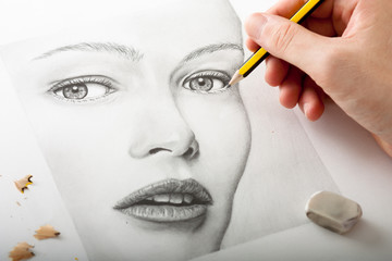 Hand Drawing a Woman Face