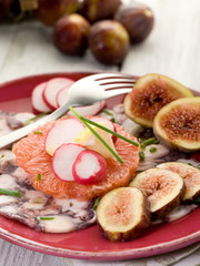 octopus carpaccio over grapefruit with figs and  radish