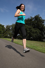 Summer exercise running outdoors for young woman